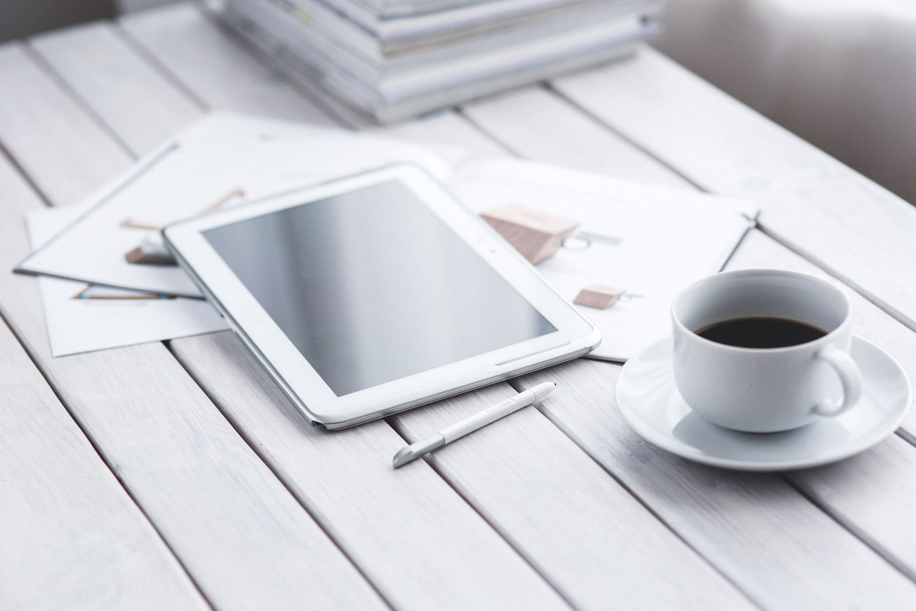Planning notes and a cup
